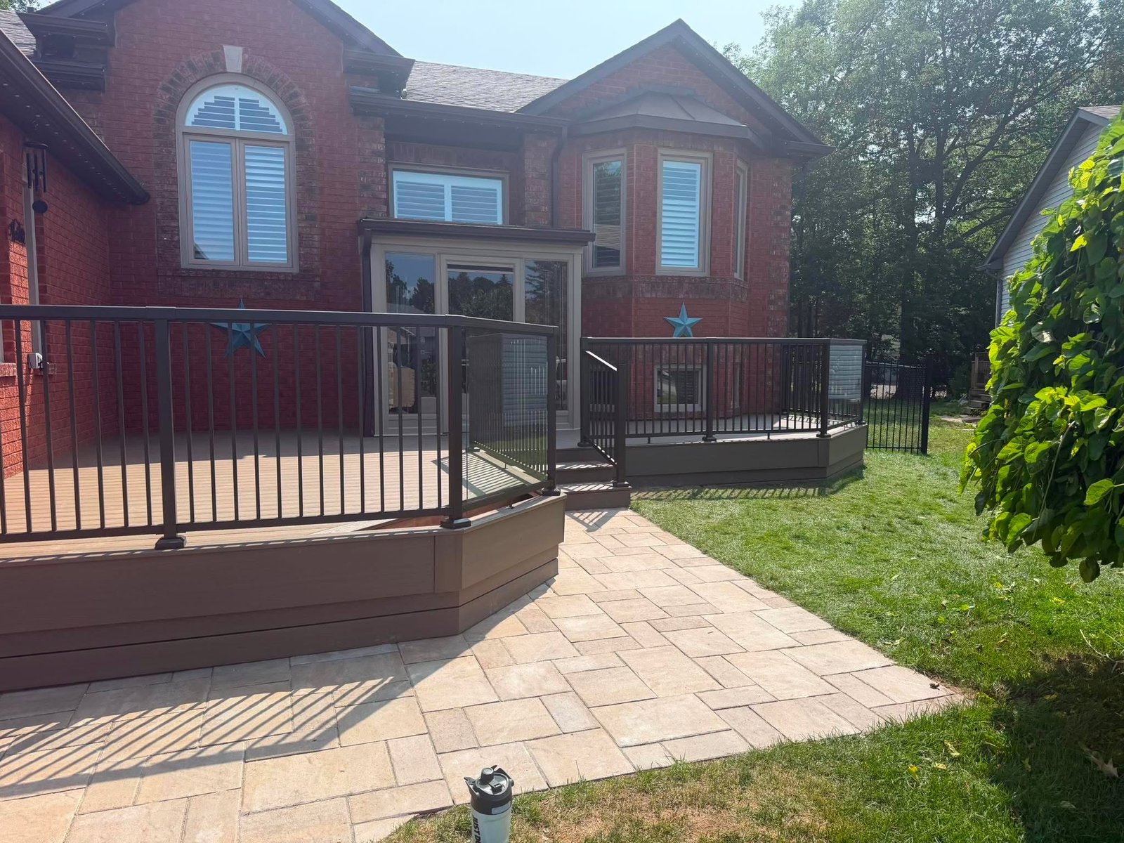modern composite deck with glass railing